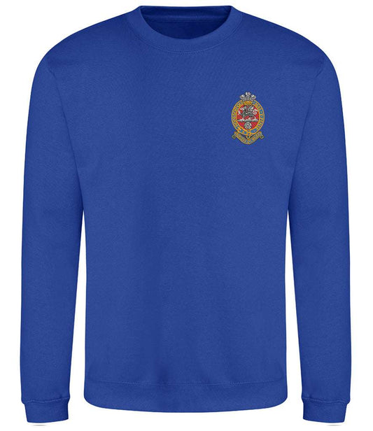 Blue sweatshirt with embroidered Princess of Wales's Royal Regiment emblem.