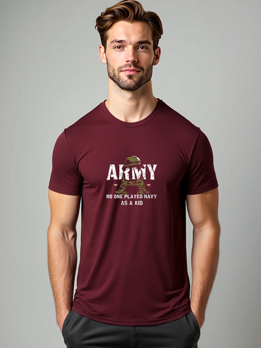 “Male model wearing a dark maroon crewneck T-shirt printed with distressed white ‘ARMY’ text over a camouflage-pattern ‘A’ and helmet icon, with ‘No one played navy as a kid’ below.”