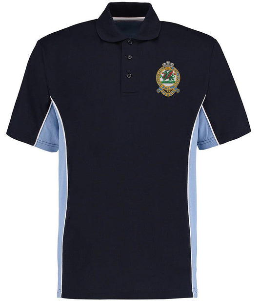 Queens Regiment Contrast Pique Polo Shirt with emblem, black with light blue contrast panels and white piped edges. Made of 65% polyester and 35% cotton.