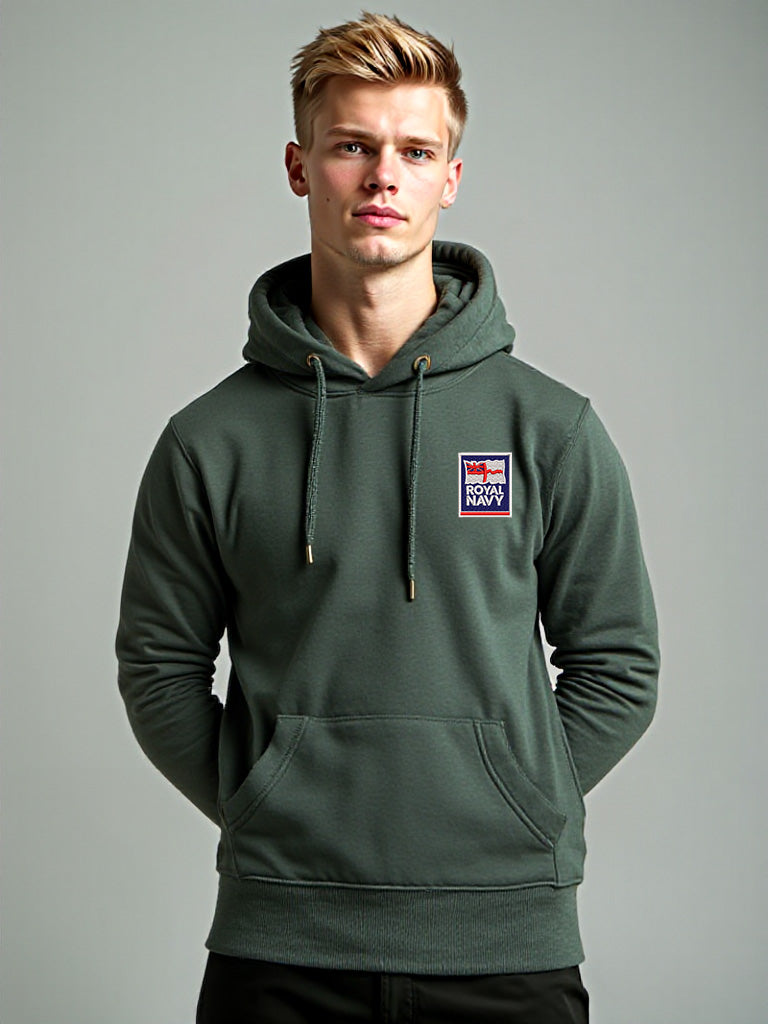 Male model dressed in a forrest green hoodie, Royal Navy emblem embroidered on the left chest, shown in a neutral indoor setting.