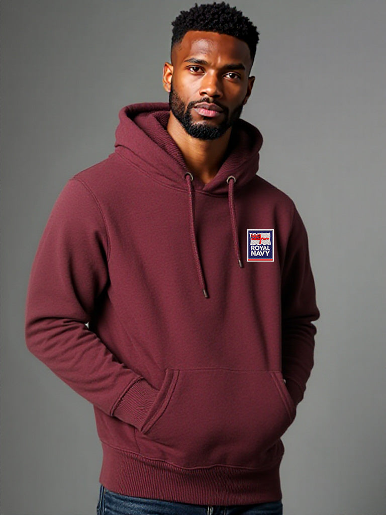 Male model in a maroon hoodie with the Royal Navy logo stitched on the left chest, hands in the front pocket.