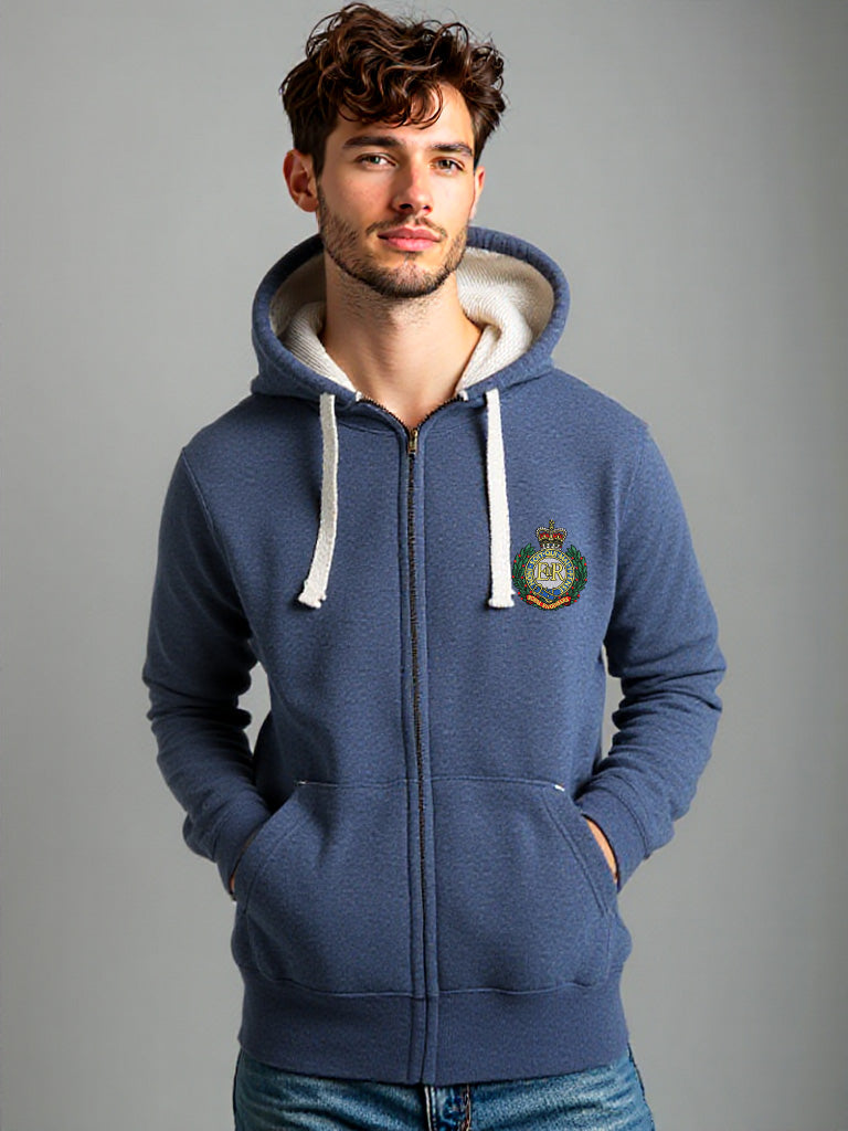 Man wearing a navy melange zip-up hoodie with Royal Engineers crest on the left chest, hands in pockets, posed against a plain background.