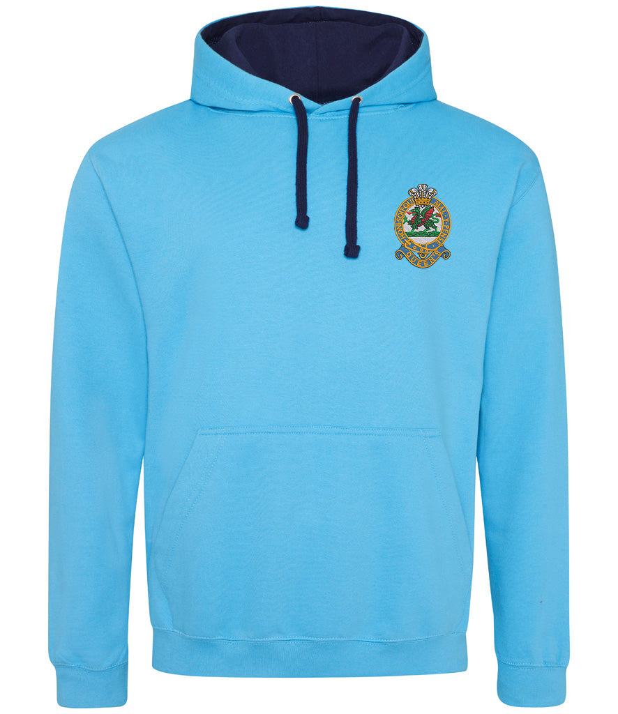 Queens Regiment Varsity Hoodie with emblem, premium cotton blend, sky blue, contrasting hood lining.