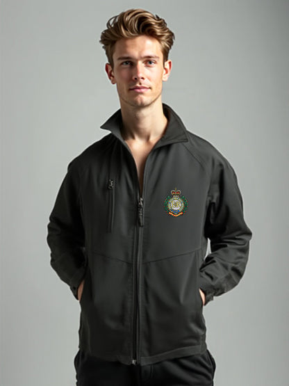 “Tall male model wearing a men’s Royal Engineers black softshell jacket with stand-up collar, full-length front zipper, chest zip pocket, side hand pockets and Royal Engineers Logo embroidered on left breast.”