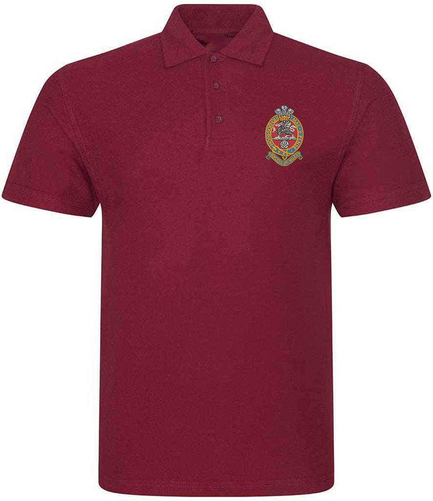 The Princess of Wales's Royal Regiment Polo Shirt with embroidered emblem, 50% polyester and 50% cotton blend, ribbed collar, and three-button placket.