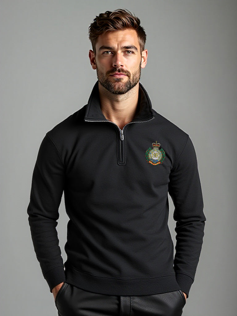 Male model wearing black Royal Engineers half zip sweatshirt with embroidered military crest, official MOD licensed quarter-zip pullover with high collar and relaxed fit