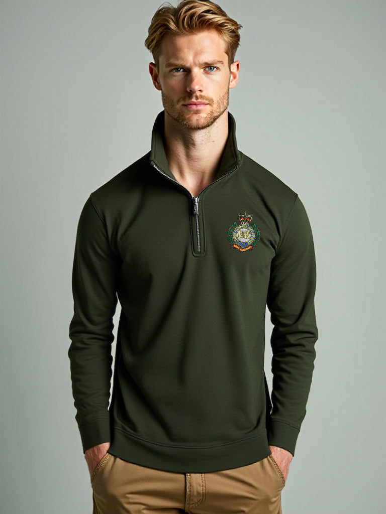 Male model in forest green Royal Engineers half zip sweatshirt with official embroidered crest, MOD approved military pullover with high collar and half zip design.