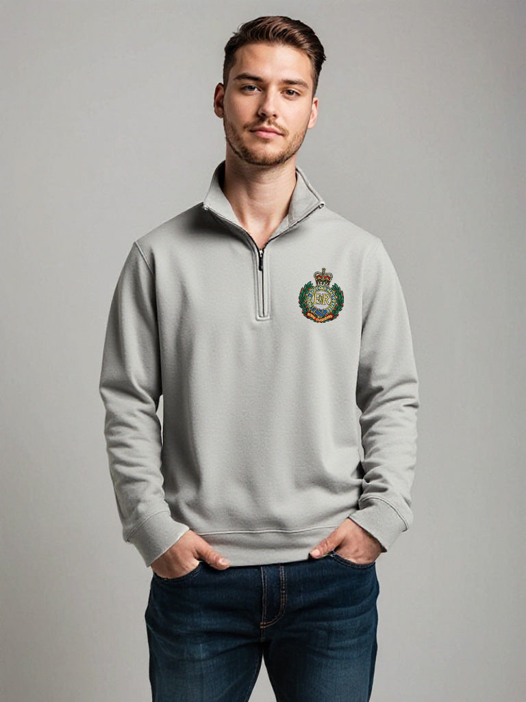 Male model in light grey Royal Engineers half zip sweatshirt with embroidered crest, official military-style pullover with high collar, MOD licensed gear.