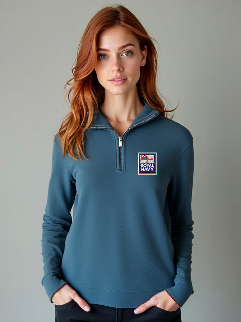 Women’s storm blue Royal Navy quarter-zip sweatshirt featuring embroidered Royal Navy logo patch, ideal for military enthusiasts, service families, and outdoor wear.