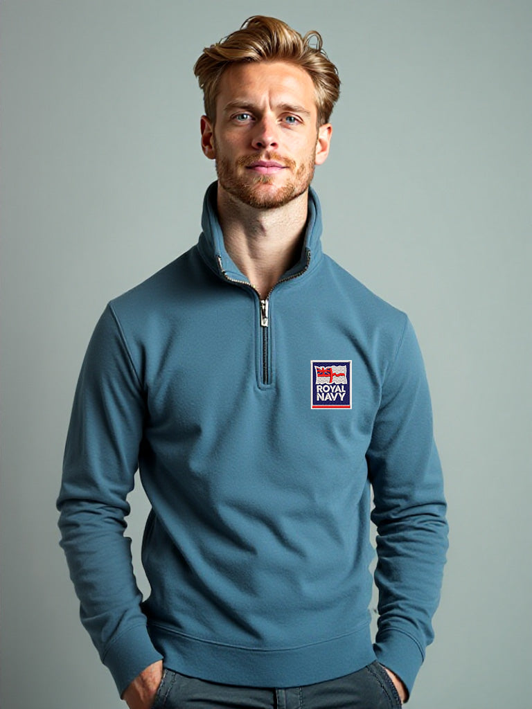 Men’s storm blue Royal Navy quarter-zip sweatshirt with embroidered official Royal Navy logo, designed for military lifestyle apparel, outdoor comfort, and armed forces supporters