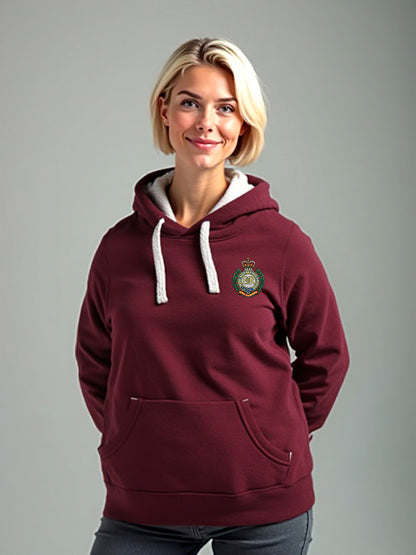 Woman wearing a maroon hoodie with a Royal Engineers crest on the left chest, featuring white drawstrings and a front pouch pocket, standing against a light grey background.