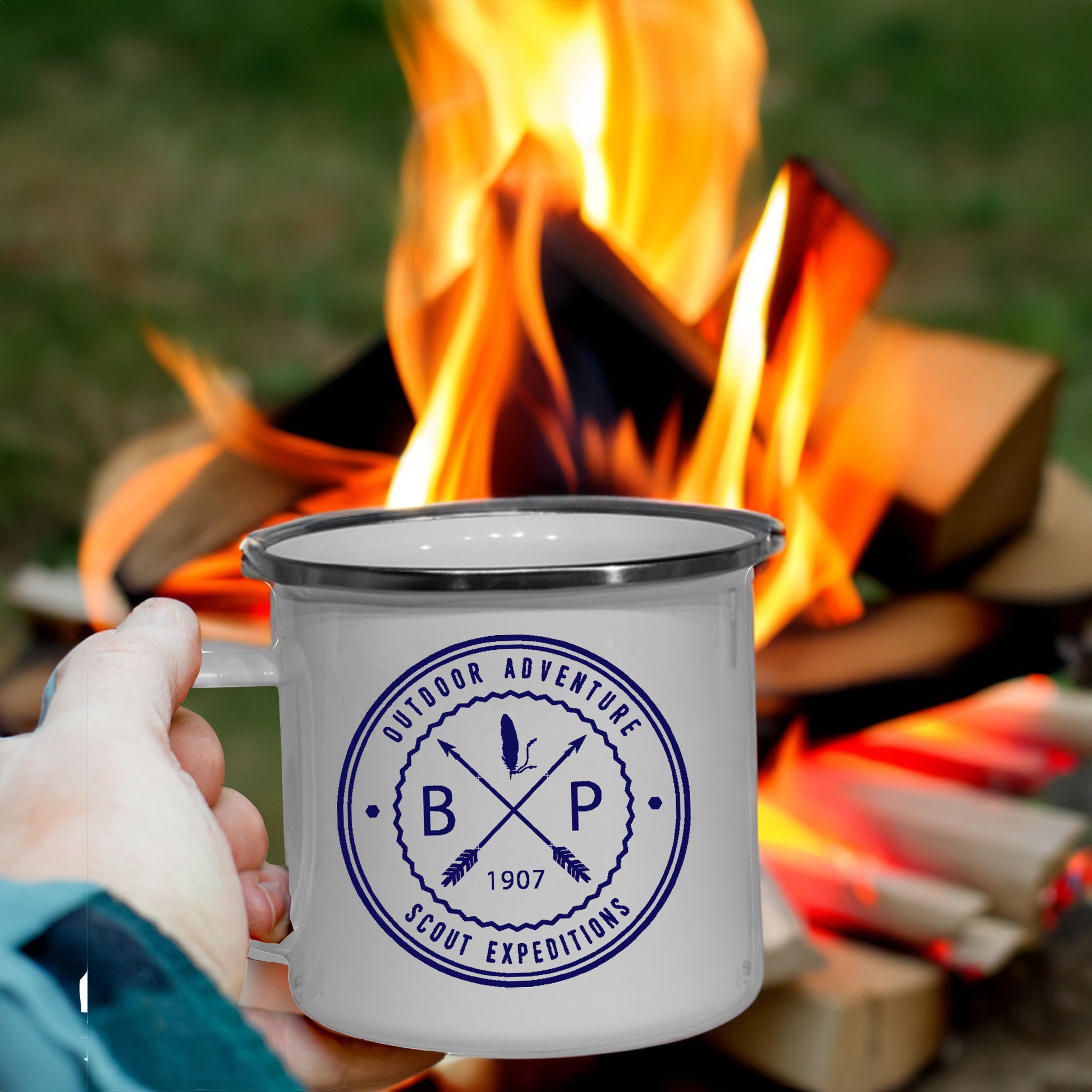 A  white enamel mug with image of BP Scouting Expeditions Since 1907