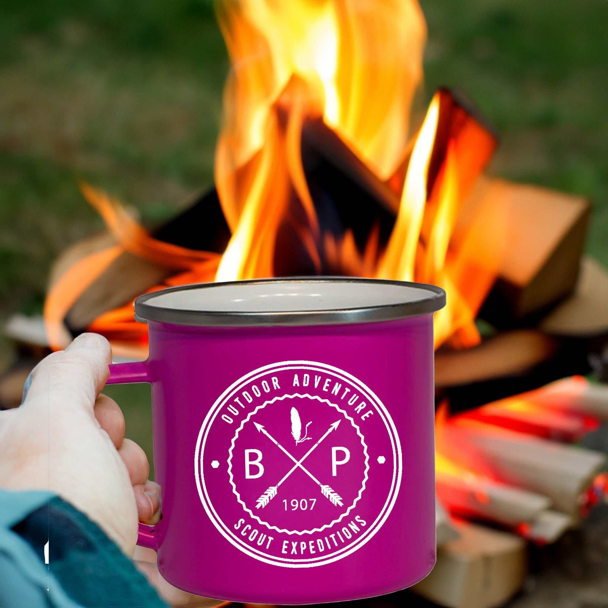 A pink enamel mug with image of BP Scouting Expeditions Since 1907