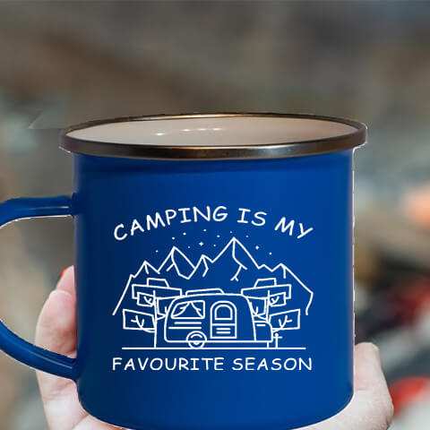 "Blue Camping Mug: Emblazoned with 'CAMPING IS MY FAVORITE SEASON.' Perfect for outdoor enthusiasts and nature lovers."