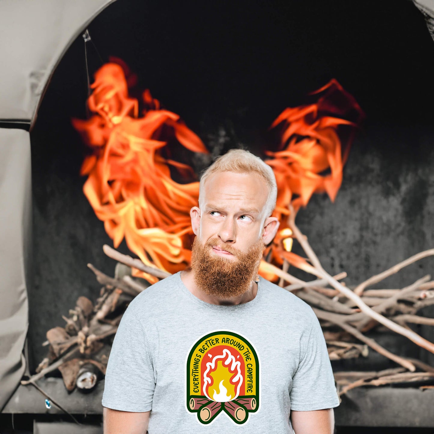 "Cozy tee featuring a campfire image, perfect for outdoor enthusiasts. Text says: 'Everything is better around the campfire.' Embrace the warmth and camaraderie!"