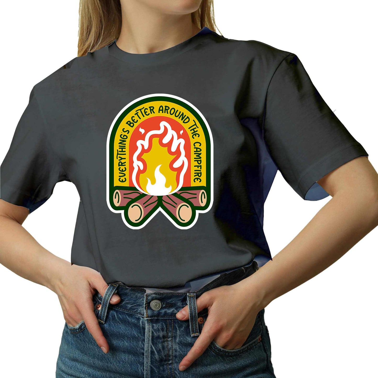 "Charcoal Cozy tee featuring a campfire image, perfect for outdoor enthusiasts. Text says: 'Everything is better around the campfire.' Embrace the warmth and camaraderie!"