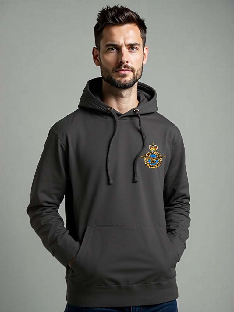 Male model wearing charcoal Royal Air Force hoodie with embroidered RAF crest, military-style men’s pullover with drawstring hood and front pocket, official RAF hoodie in dark grey.