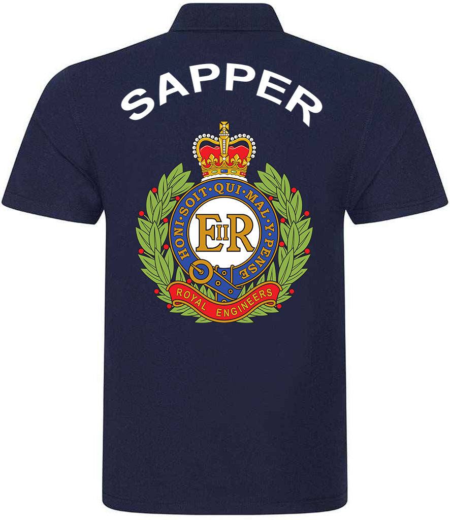 Back view of navy Royal Engineers polo shirt featuring large full-colour embroidered Sapper crest and bold 'SAPPER' text above the logo