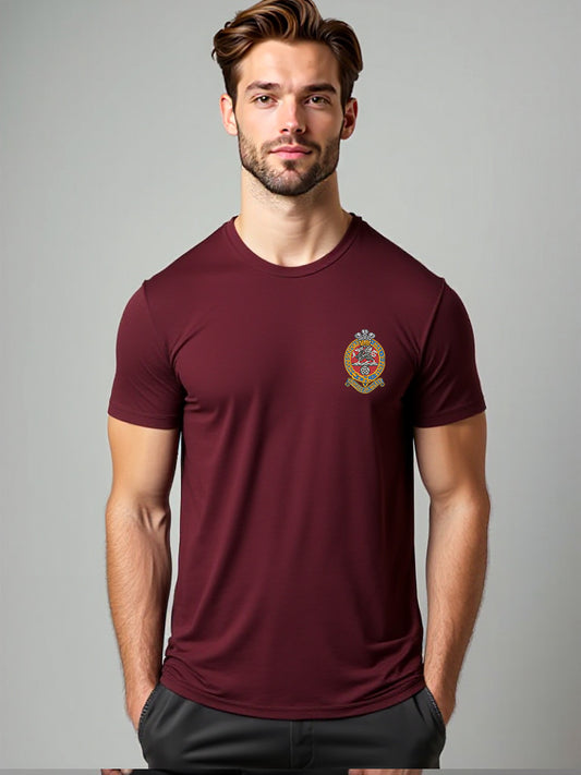 Man wearing maroon Princess of Wales’s Royal Regiment T-shirt with regimental crest on chest, military-inspired casual wear for veterans and supporters.