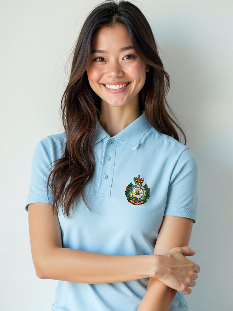 Women's sky blue Royal Engineers polo shirt with detailed embroidered crest on chest and bold Sapper logo on back. Classic fit with soft collar and button placket.