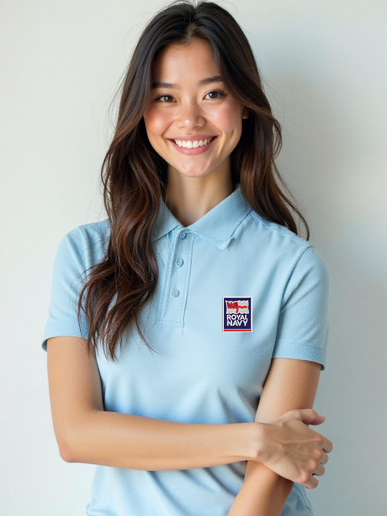 Women’s sky blue Royal Navy polo shirt featuring a stitched Royal Navy crest. Soft, breathable fabric designed for comfort and casual wear. Perfect for military supporters, Royal Navy personnel, and veteran community pride.