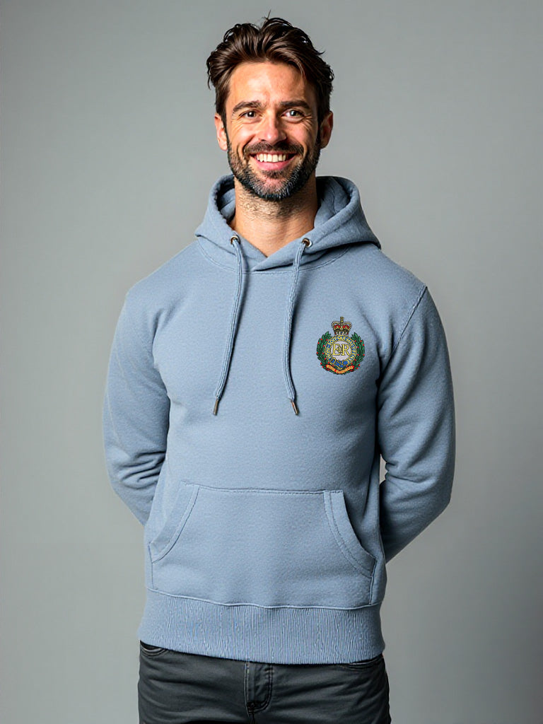 Male model wearing a storm blue pullover hoodie with Royal Engineers crest on the left chest.