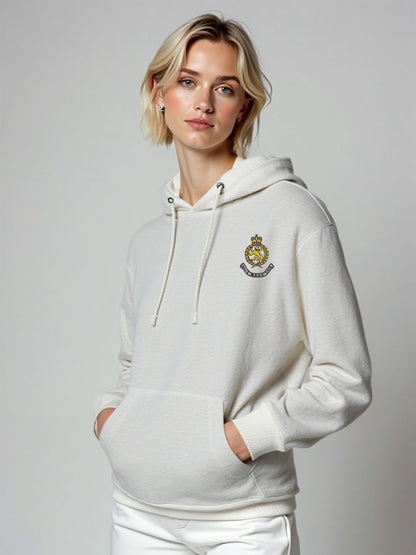 Female model in a white WRAC hoodie, WRAC crest on the left chest, presented with a clean and simple composition.